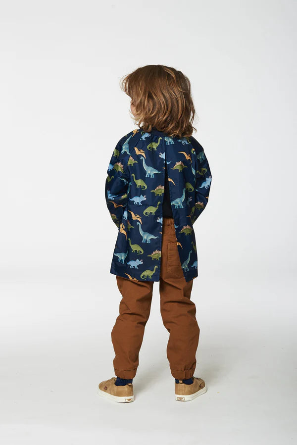 Deux Par Deux - School Apron Navy Blue Printed Dinosaurs/ Tablier d'école imprimé bleu marine avec dinosaures